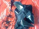 Mrs Jones' heels + her panties - gusset side up for your interest - on the backdrop of **my** red patent, PVC pencil skirt. Click to see Dr Jones’s pic